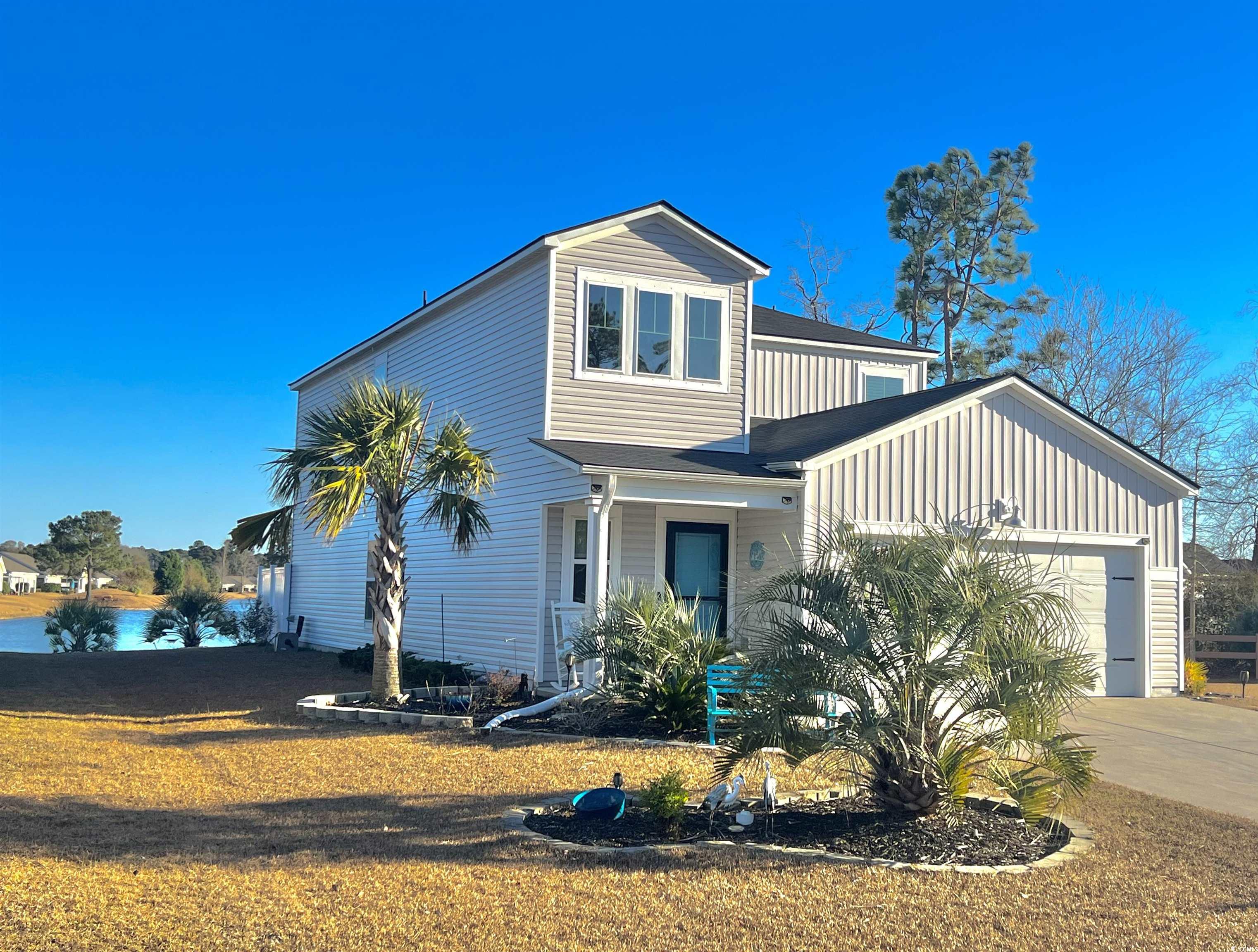 View of front of home with a garage