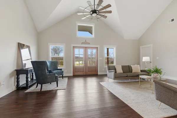 a workspace with furniture and wooden floor