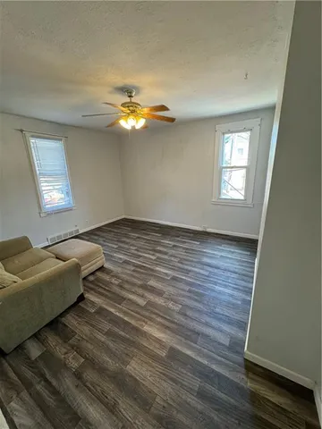 a view of livingroom with furniture and chandelier