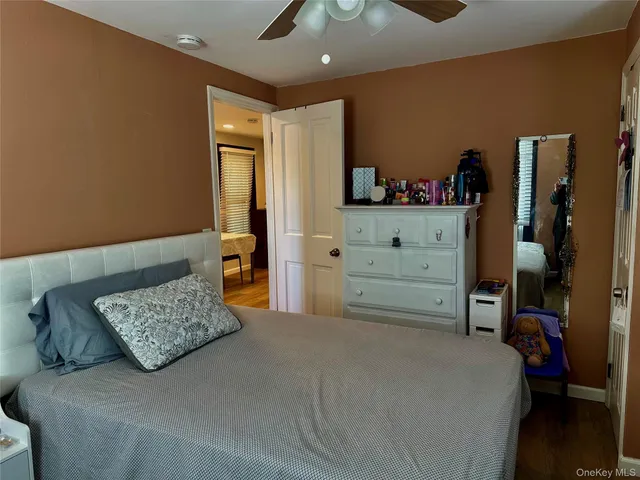 a bed room with a bed and a couch