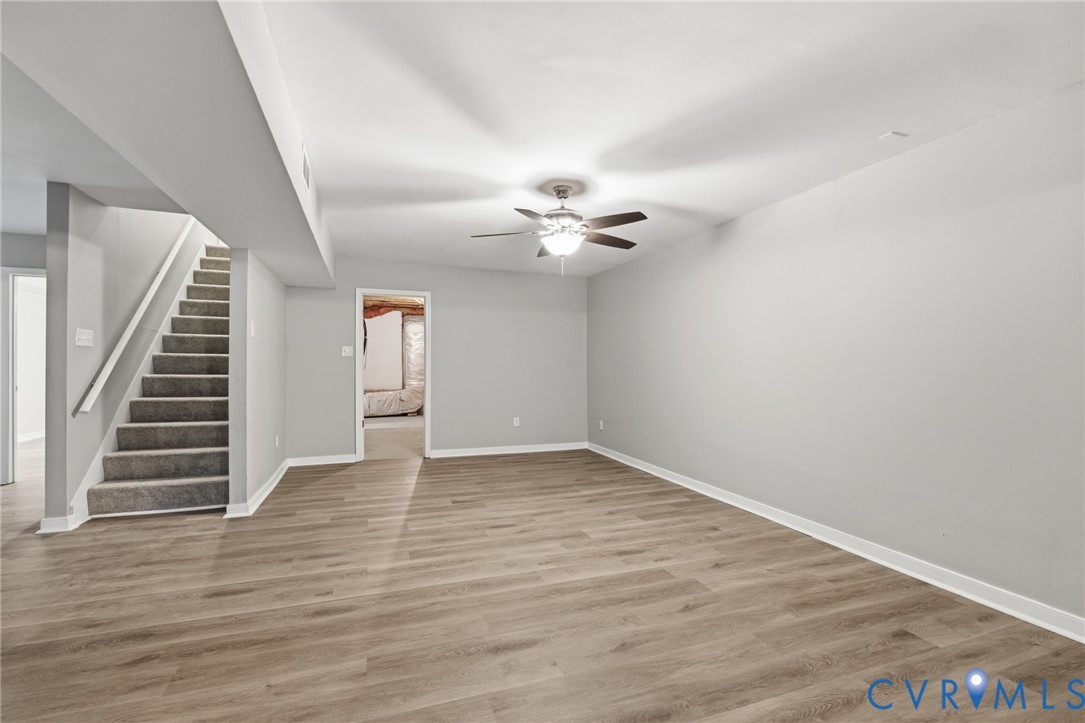 10731 Spring Run Road Chesterfield, VA 23832 - Photo 23 of 33 wooden floor in an empty room with a window