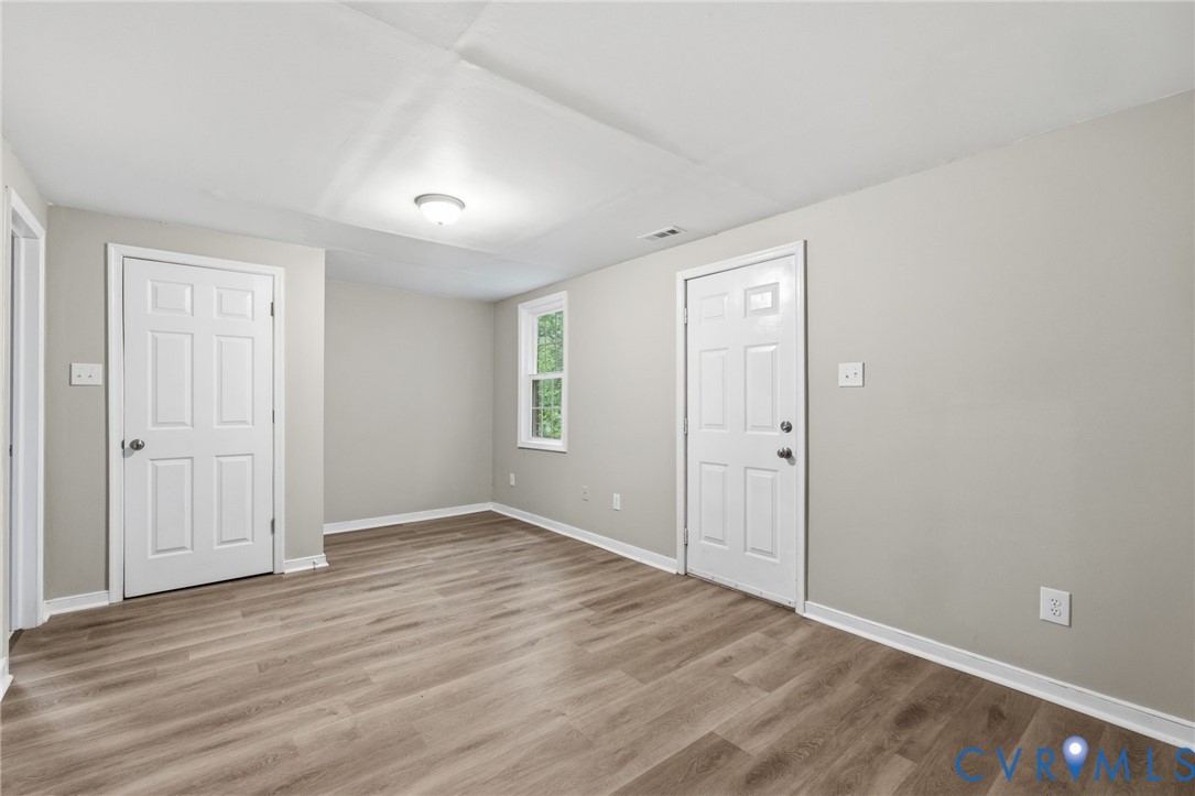 10731 Spring Run Road Chesterfield, VA 23832 - Photo 29 of 33 a view of an empty room with wooden floor