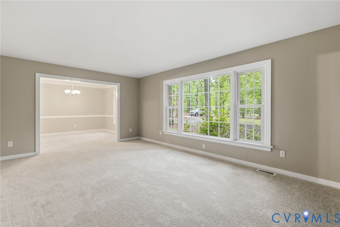 10731 Spring Run Road Chesterfield, VA 23832 - Photo 5 of 33 a view of an empty room with a window