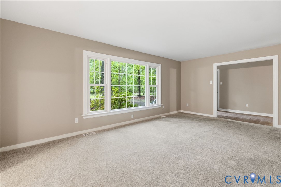 10731 Spring Run Road Chesterfield, VA 23832 - Photo 6 of 33 an empty room with a window