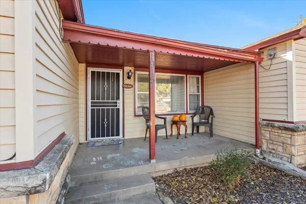a view of a yard covered in snow