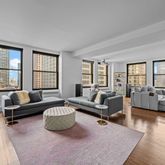 a living room with furniture and a couch