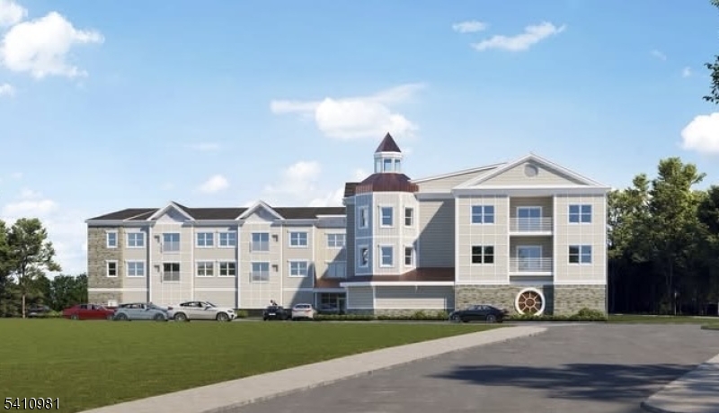 1 Main Street, Unit 2A High Bridge, NJ 08829 - Photo 1 of 2 a view of a white house with yard and windows