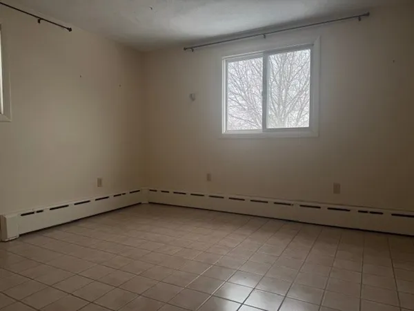 an empty room with a window