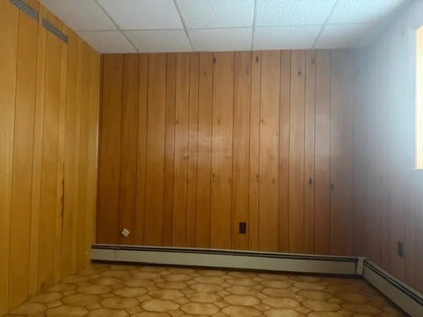 a view of small space with wooden floor