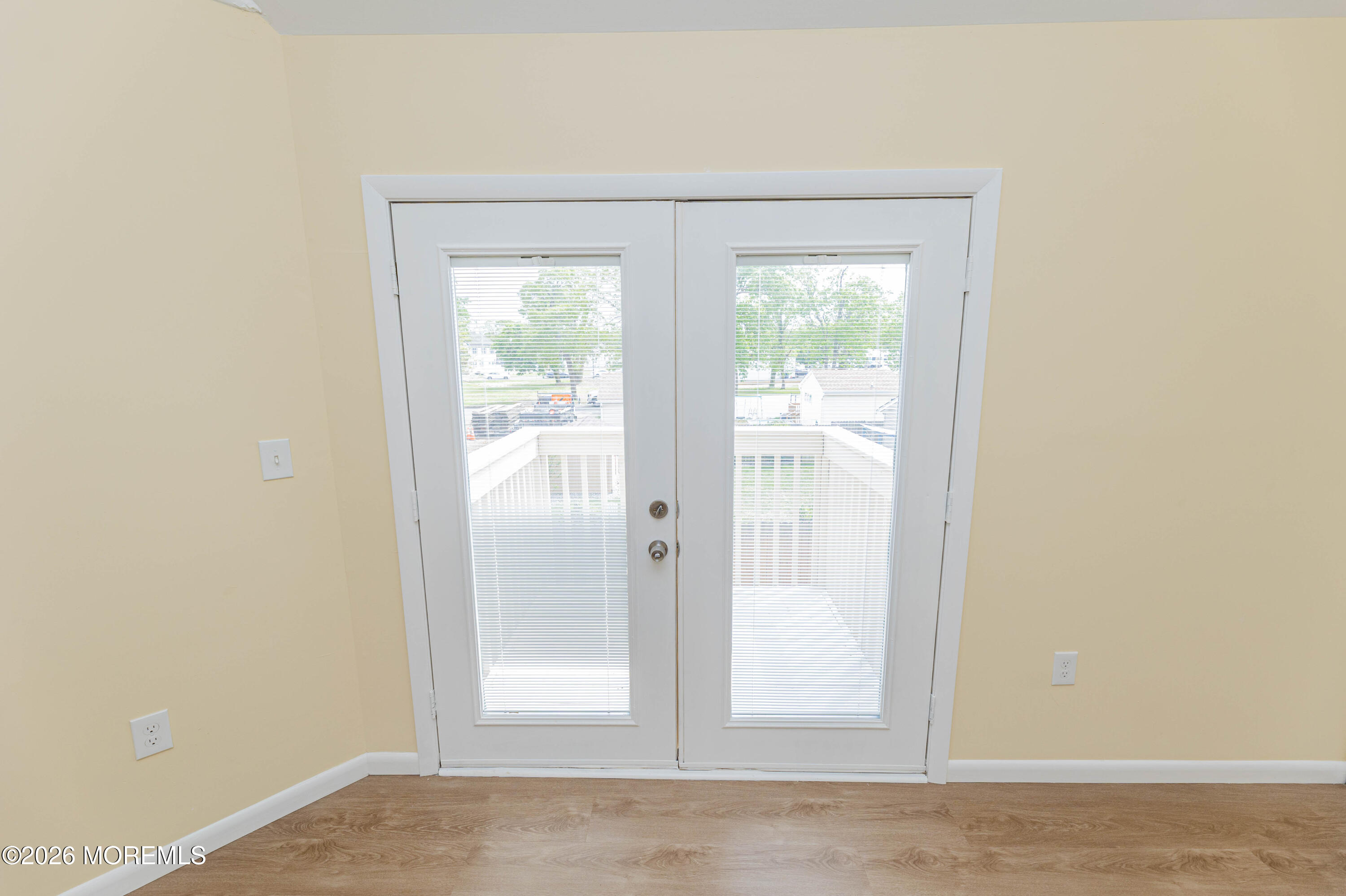 2408 Herbertsville Road Point Pleasant, NJ 08742 - Photo 38 of 82 a view of a small space with wooden floor and a window