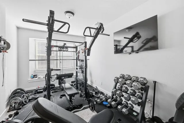 a view of a livingroom with furniture and windows