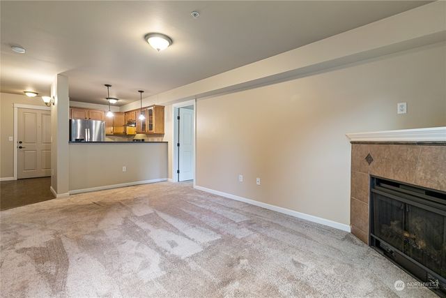 a view of a kitchen and a window