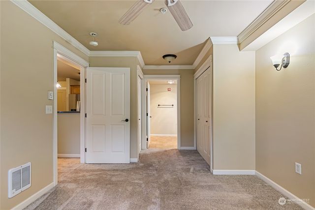 a view of a hallway with closet area
