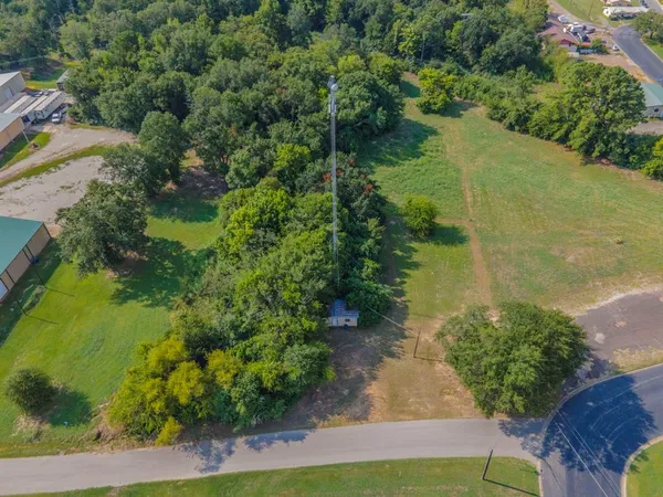 an aerial view of residential house with outdoor space