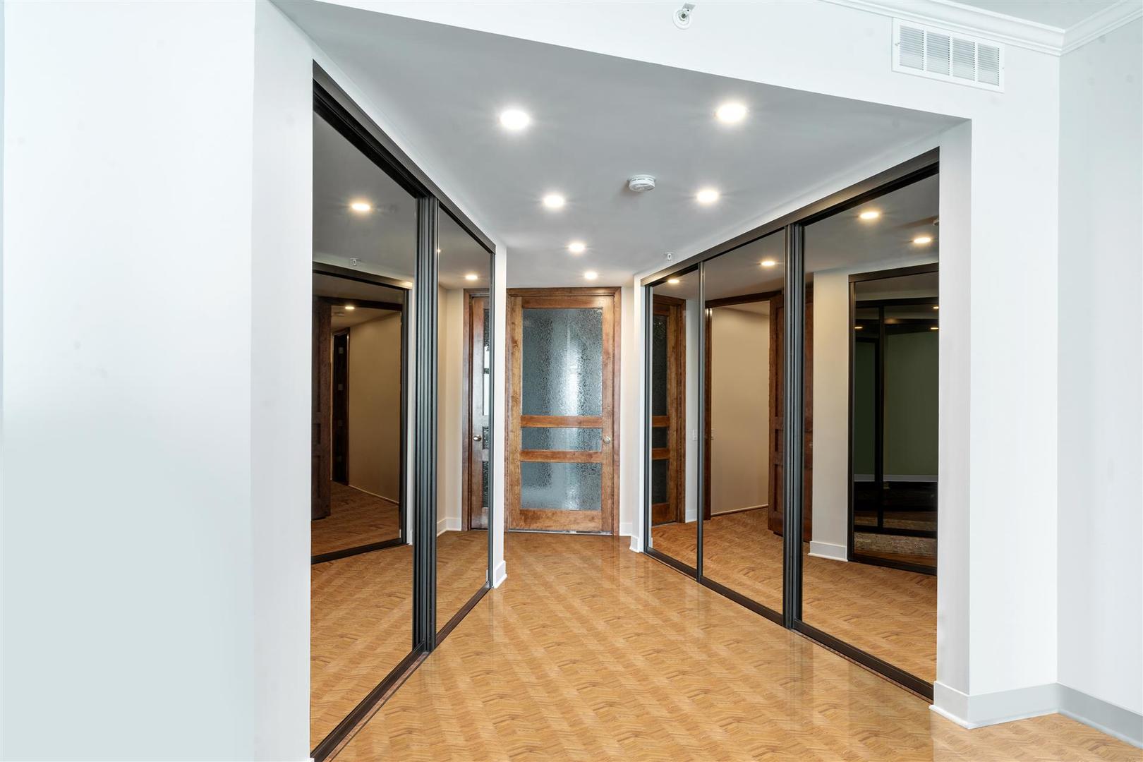680 North Lake Shore Drive, Unit 1103 Chicago, IL 60611 - Photo 17 of 28 a view of hallway with walk in closet and bathroom