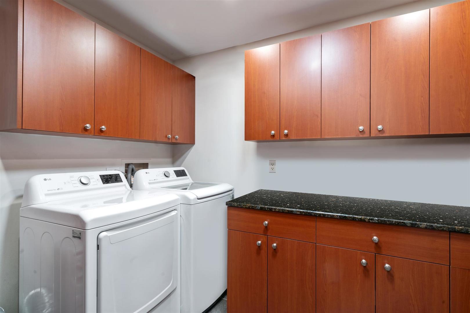 680 North Lake Shore Drive, Unit 1103 Chicago, IL 60611 - Photo 21 of 28 a utility room with dryer and washer