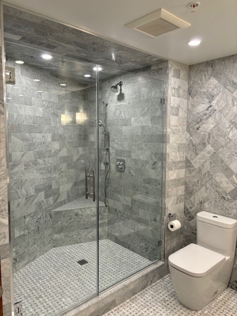 680 North Lake Shore Drive, Unit 1103 Chicago, IL 60611 - Photo 26 of 28 a bathroom with a shower and a toilet
