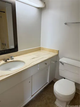 a bathroom with a toilet and a bathtub