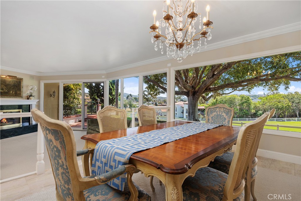 Dinning room featuring the EXCEPTIONAL  "park like" view.