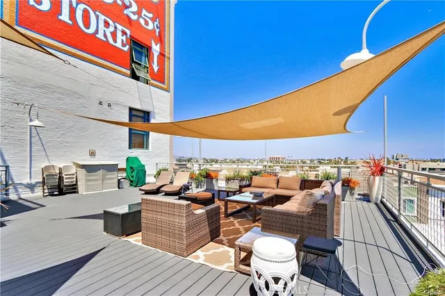 a view of a terrace with furniture