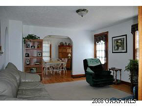614 Battlefield Road New Hope, VA 24437 - Photo 6 of 12 a living room with furniture and a dining table