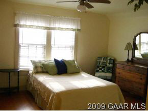 614 Battlefield Road New Hope, VA 24437 - Photo 10 of 12 a bedroom with a bed and a dresser
