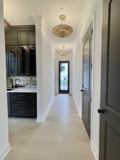 a bathroom with a sink toilet and mirror