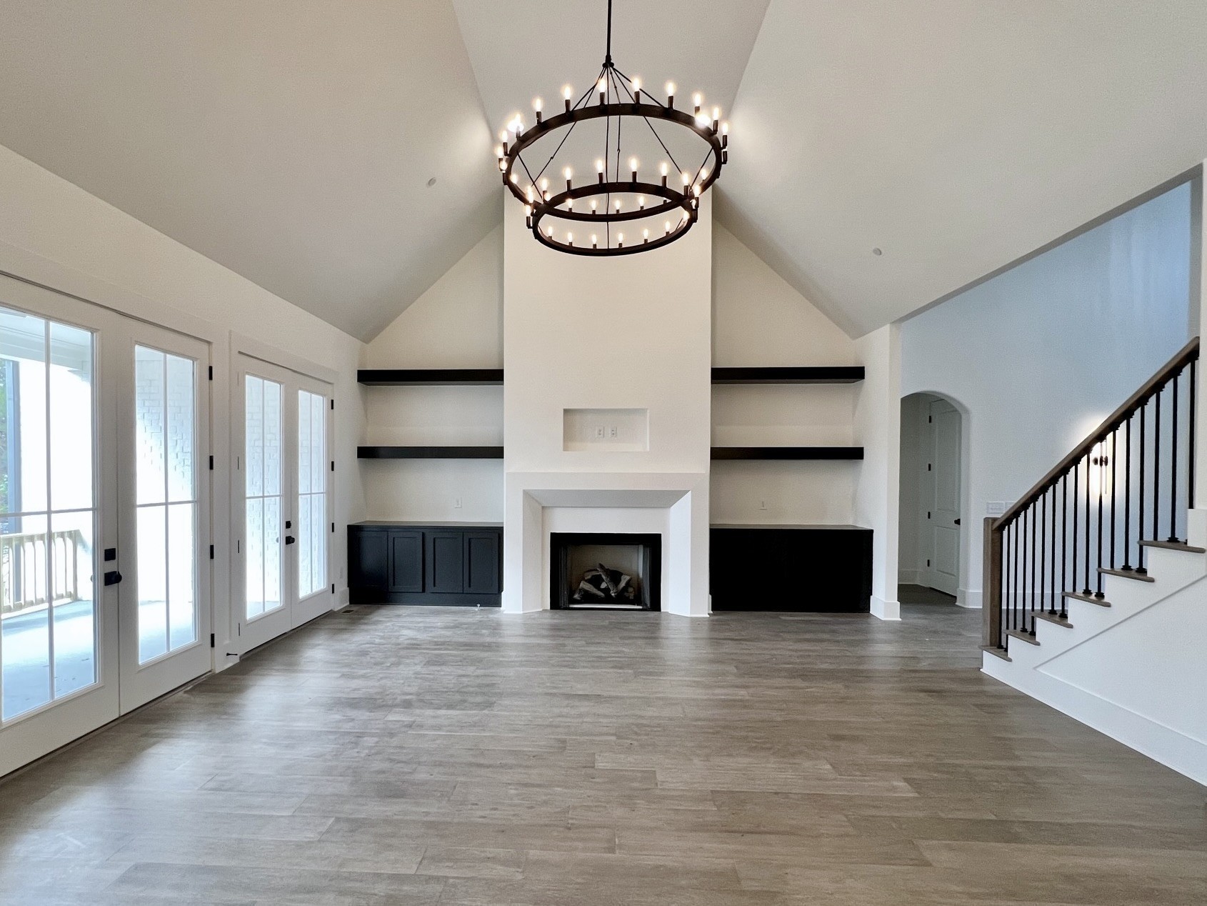 9914 Elland Road Brentwood, TN 37027 - Photo 19 of 64 a view of a livingroom with a fireplace and window