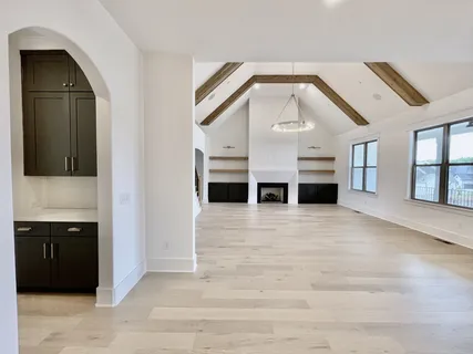 a kitchen with a sink cabinets and counter space