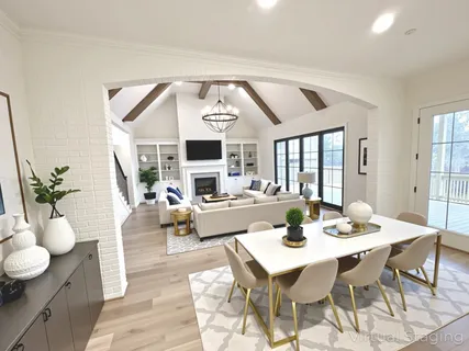 a kitchen with kitchen island a sink stainless steel appliances and cabinets