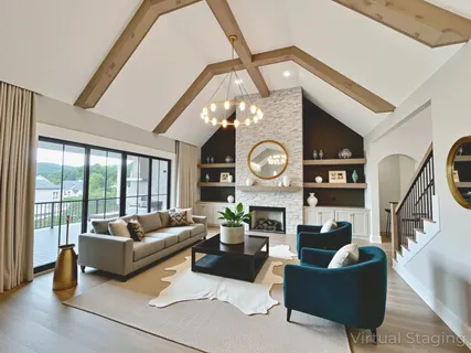 a kitchen with a stove a refrigerator a sink and chairs