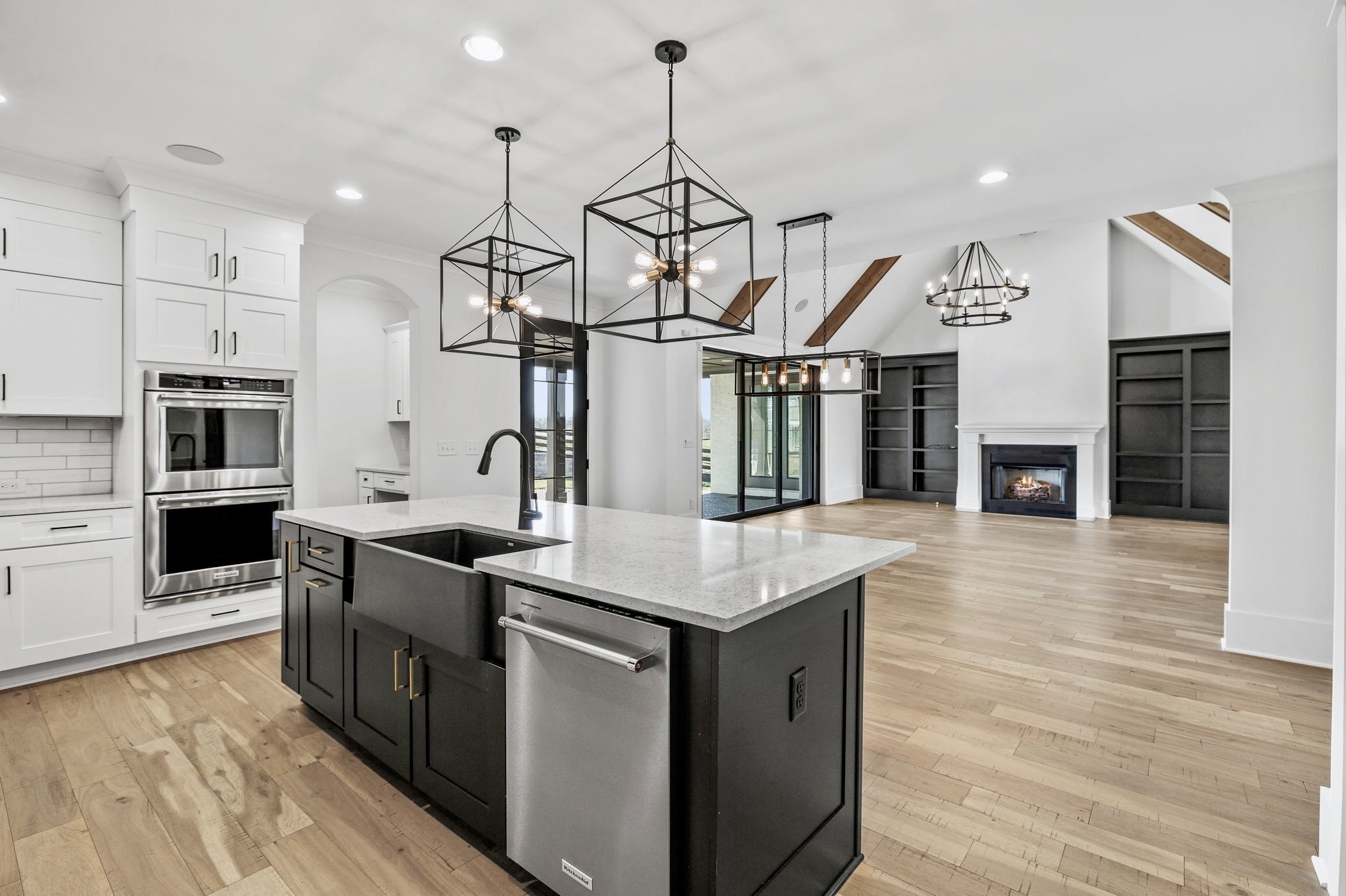 9914 Elland Road Brentwood, TN 37027 - Photo 35 of 64 a kitchen with stainless steel appliances granite countertop a sink a stove and a wooden floors