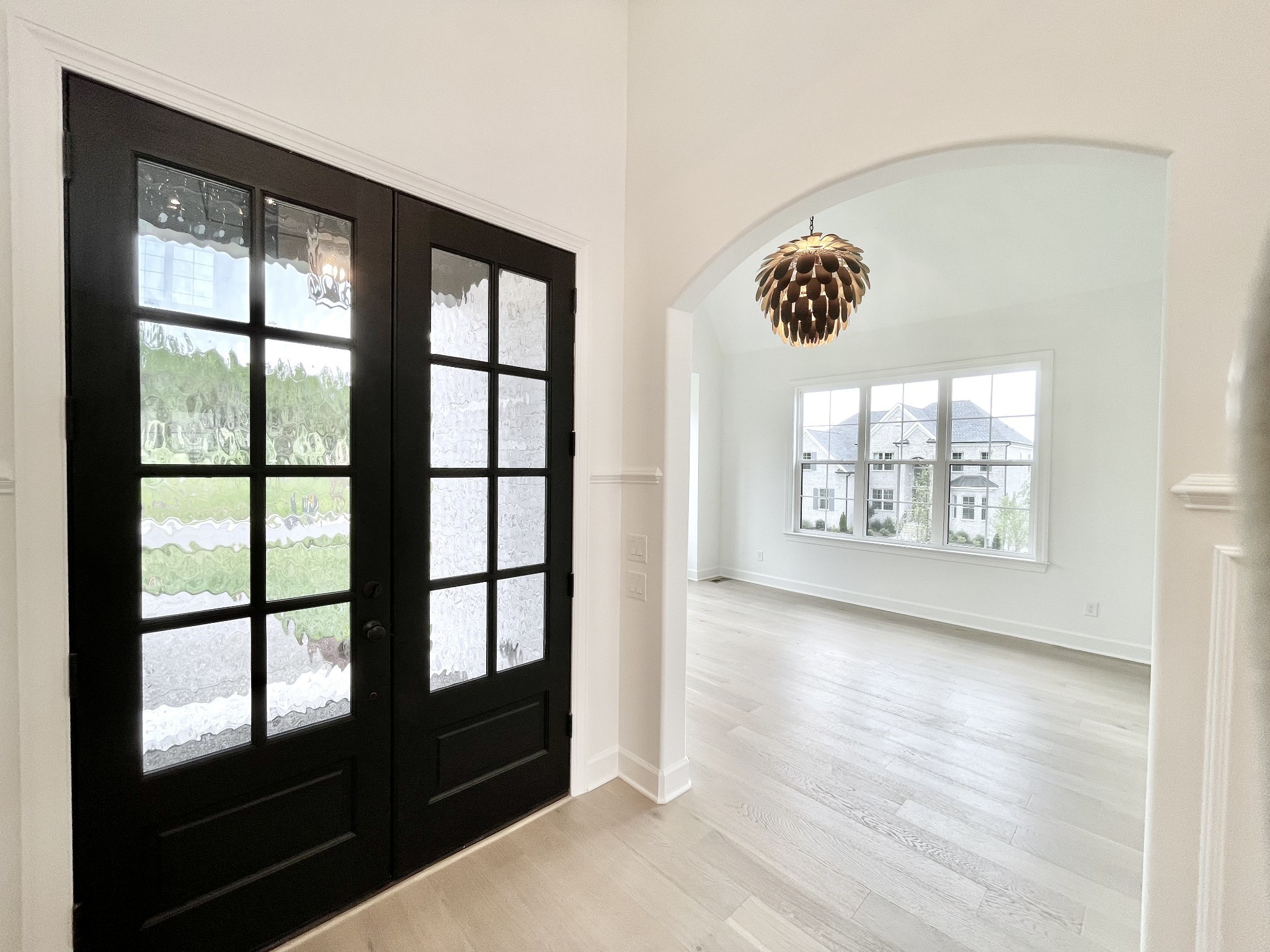 9914 Elland Road Brentwood, TN 37027 - Photo 4 of 64 wooden floor in an empty room with a window