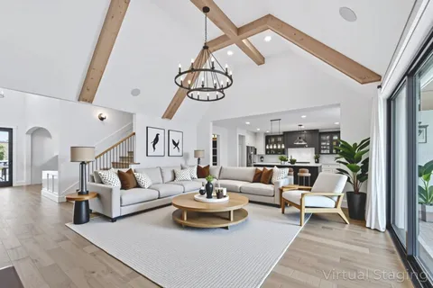 a view of entryway and hall with a wooden floor
