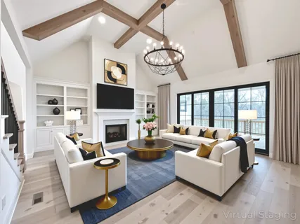 a spacious bedroom with a bed couch and large window