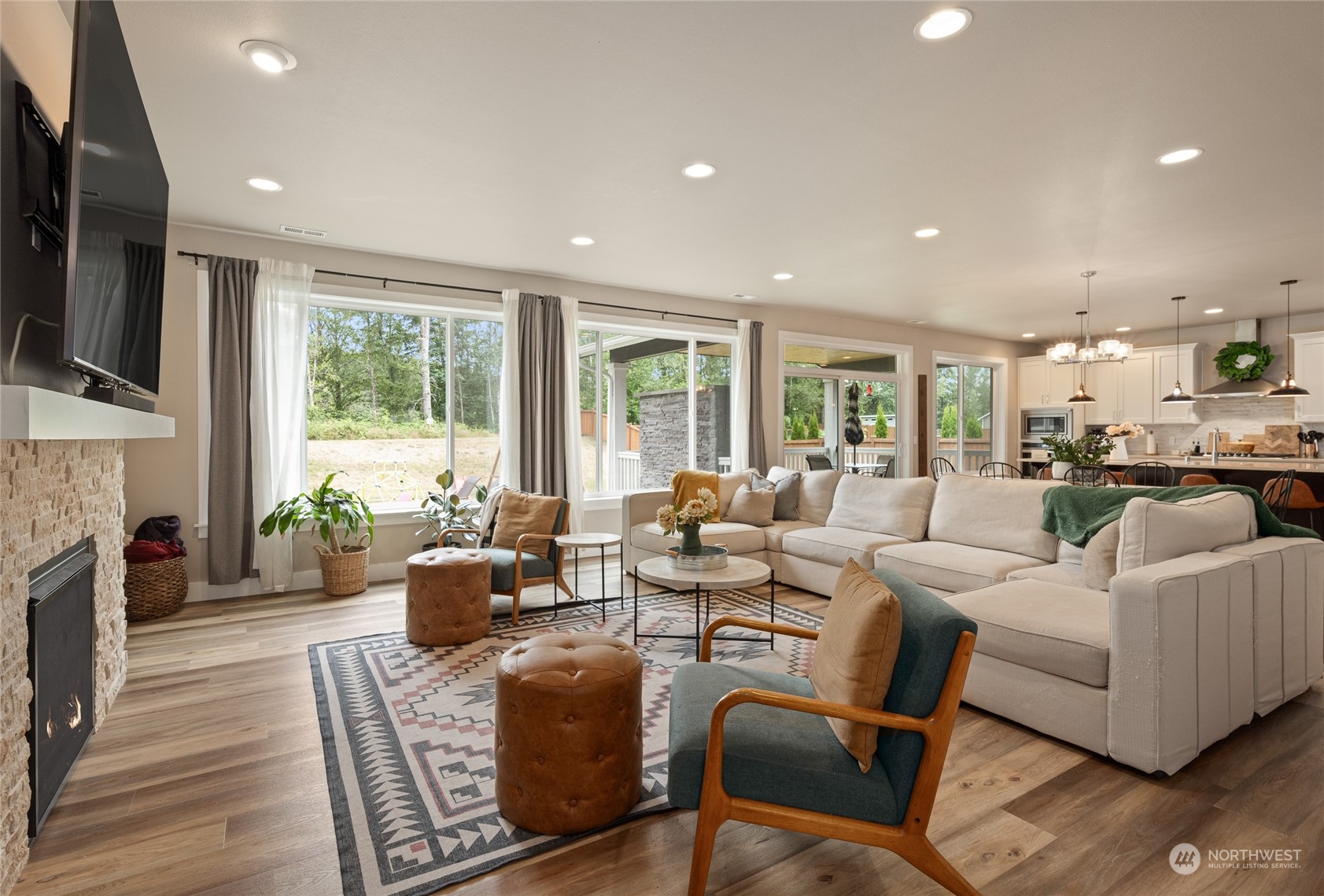 3522 Creswell Road Snohomish, WA 98290 - Photo 17 of 40 a living room with fireplace furniture and a large window