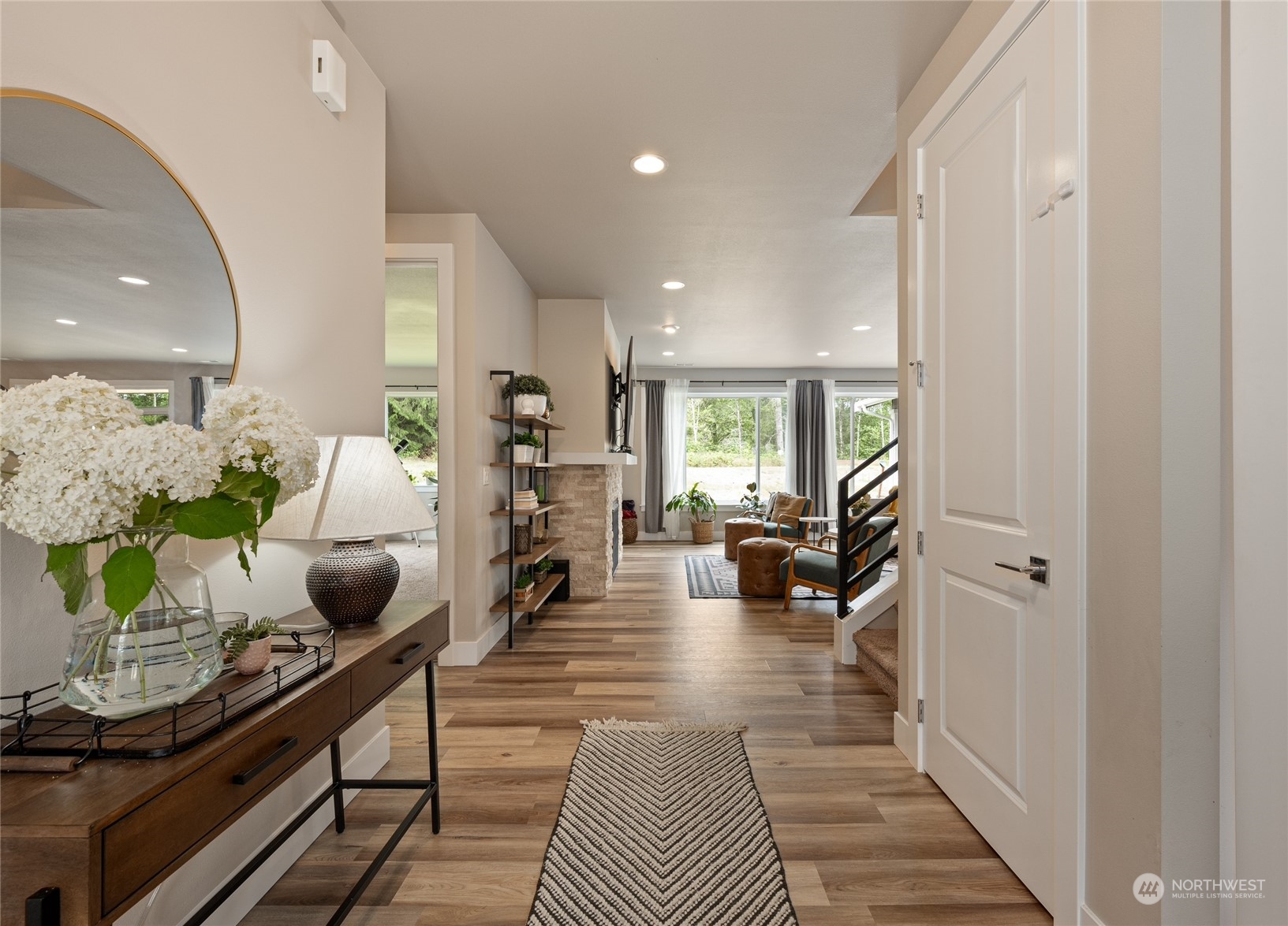 3522 Creswell Road Snohomish, WA 98290 - Photo 6 of 40 a living room with furniture and a chandelier