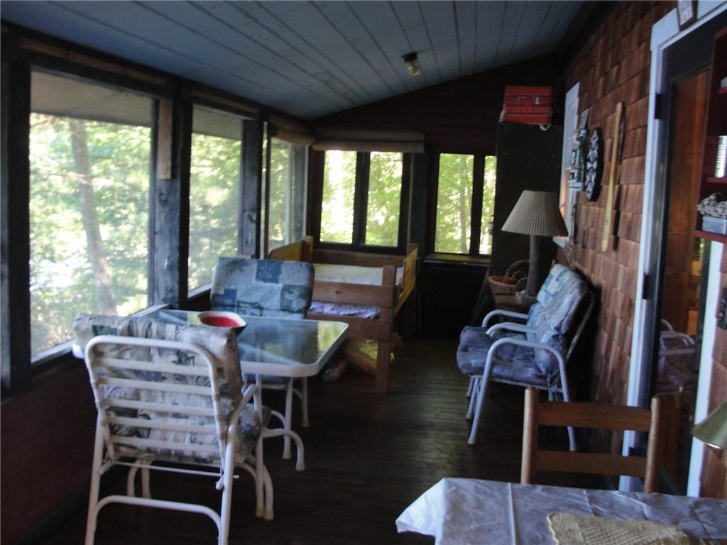 219 Win Brown Road Stoneham, ME 04231 - Photo 11 of 42 Porch - screened in with wood floor.