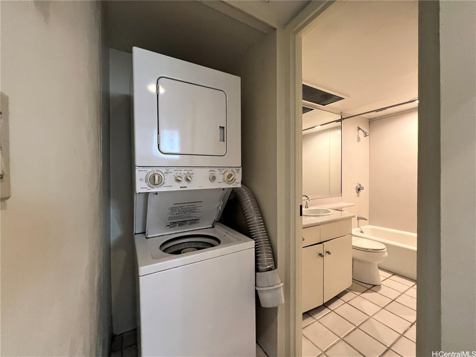 1860 Ala Moana Boulevard, Unit 902B Honolulu, HI 96815 - Photo 15 of 15 a room with a washer and dryer
