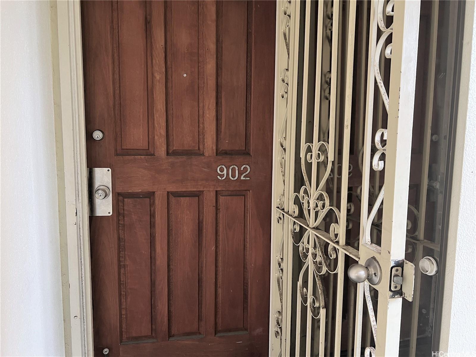 1860 Ala Moana Boulevard, Unit 902B Honolulu, HI 96815 - Photo 2 of 15 a view of a entryway with wooden walls