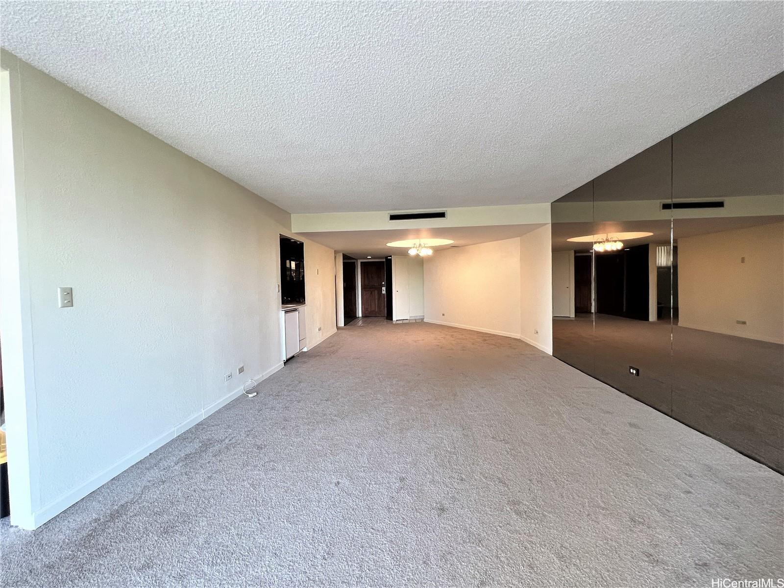 1860 Ala Moana Boulevard, Unit 902B Honolulu, HI 96815 - Photo 6 of 15 a view of a big room with closet and windows