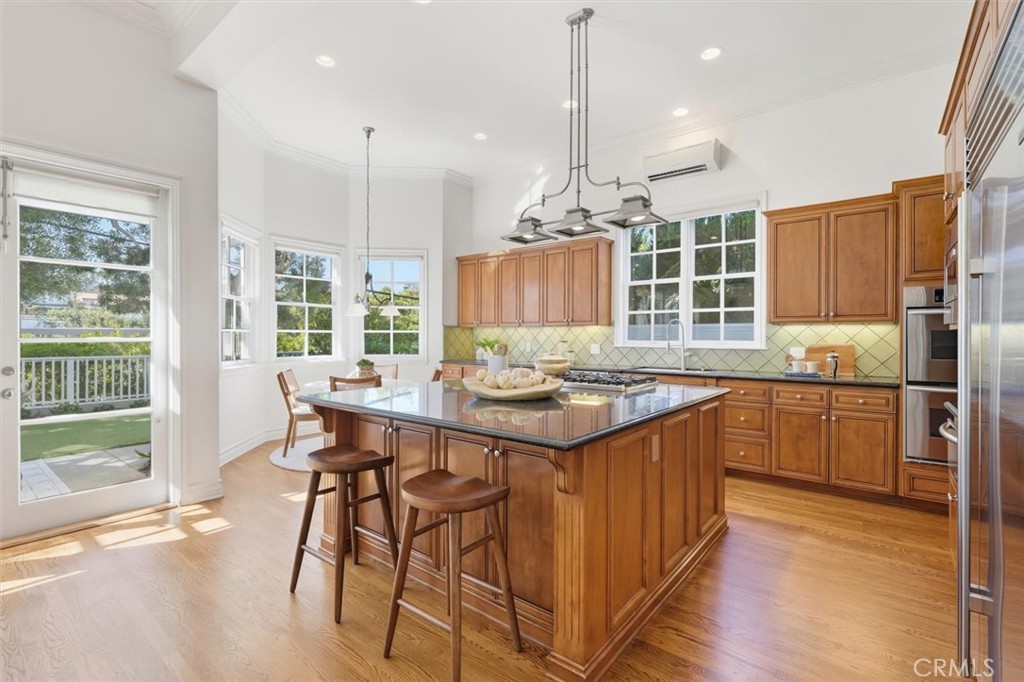 2909 Maple Avenue Manhattan Beach, CA 90266 - Photo 20 of 57 a kitchen with stainless steel appliances granite countertop a stove and refrigerator
