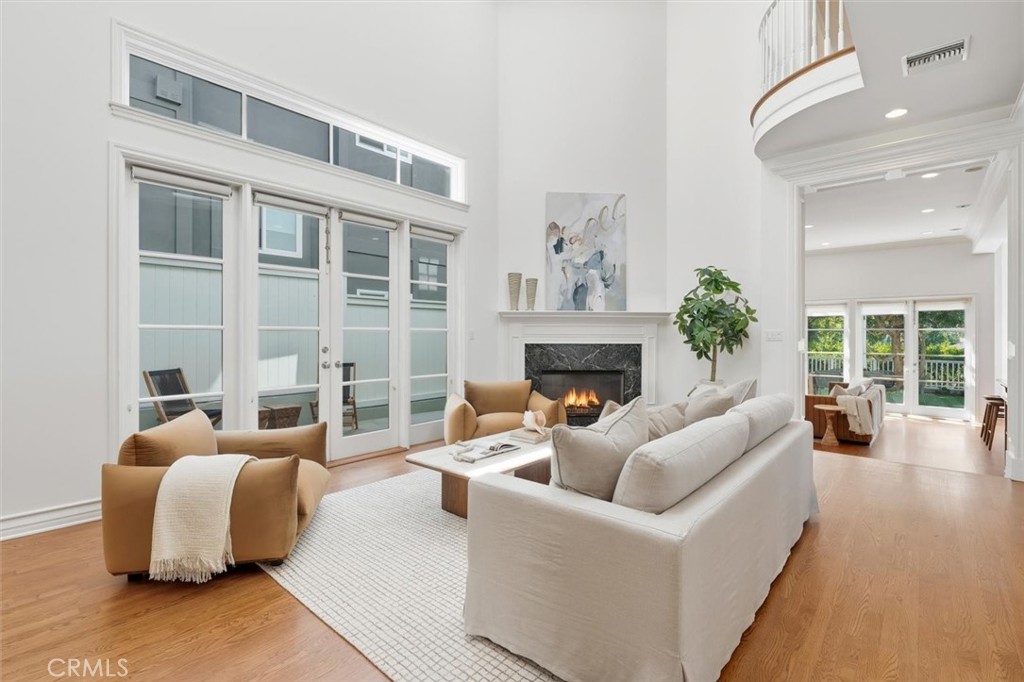 2909 Maple Avenue Manhattan Beach, CA 90266 - Photo 3 of 57 a living room with furniture and a fireplace