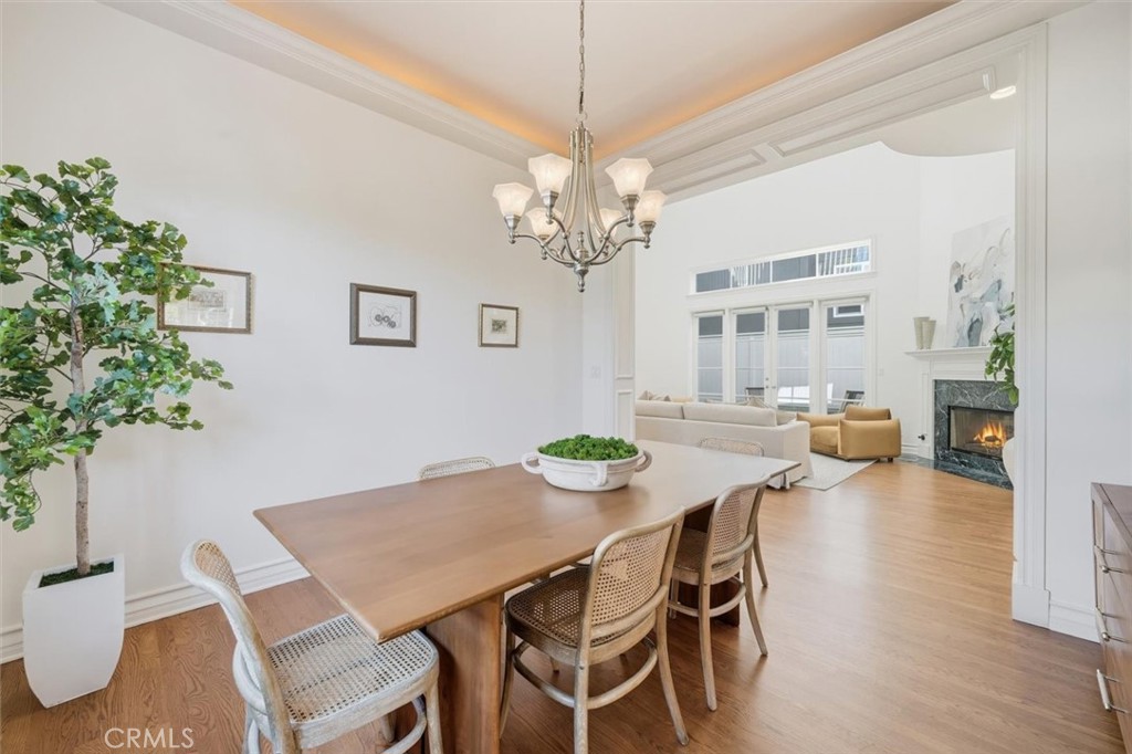 2909 Maple Avenue Manhattan Beach, CA 90266 - Photo 31 of 57 a view of a dining room with furniture and chandelier