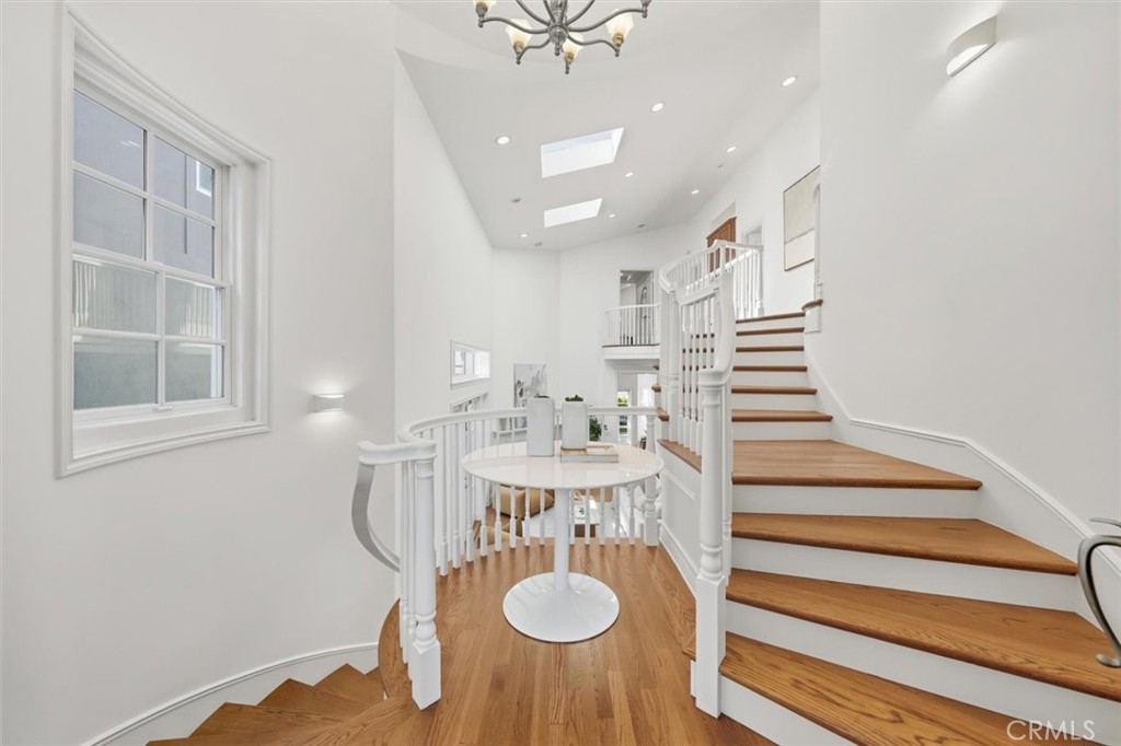2909 Maple Avenue Manhattan Beach, CA 90266 - Photo 35 of 57 a view of a dining room with furniture and a chandelier