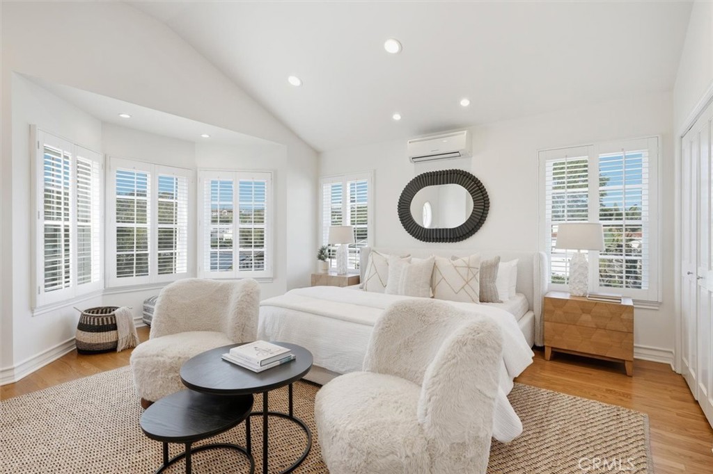 2909 Maple Avenue Manhattan Beach, CA 90266 - Photo 48 of 57 a bedroom with a bed a couch and a large window