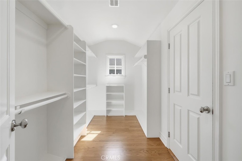 2909 Maple Avenue Manhattan Beach, CA 90266 - Photo 52 of 57 a view of a hallway with closet and wooden floor