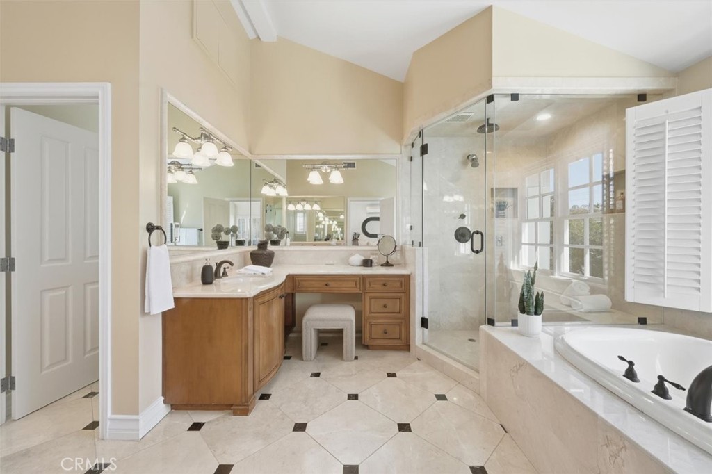 2909 Maple Avenue Manhattan Beach, CA 90266 - Photo 53 of 57 a large bathroom with a large tub sink shower and mirror