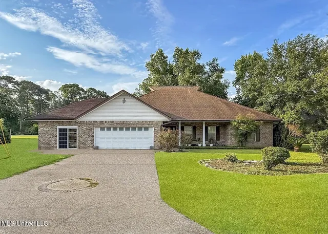 $495,000 | 74617 Diamondhead Drive North, Diamondhead, MS 39525