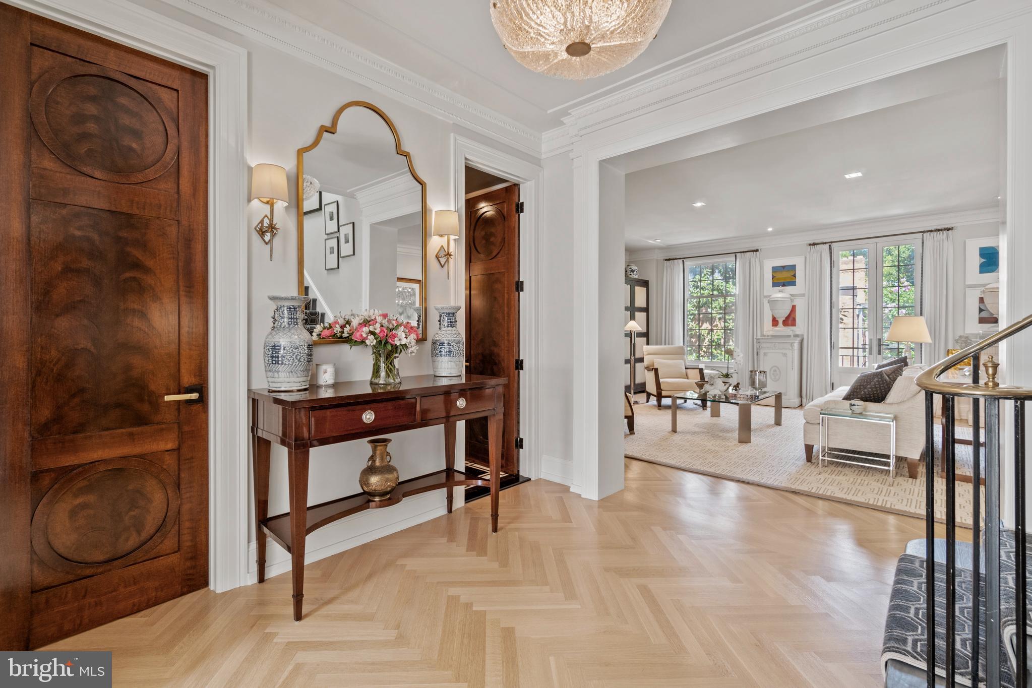 3323 R Street Northwest Washington, DC 20007 - Photo 25 of 54 Landing with herringbone floors & custom doors
